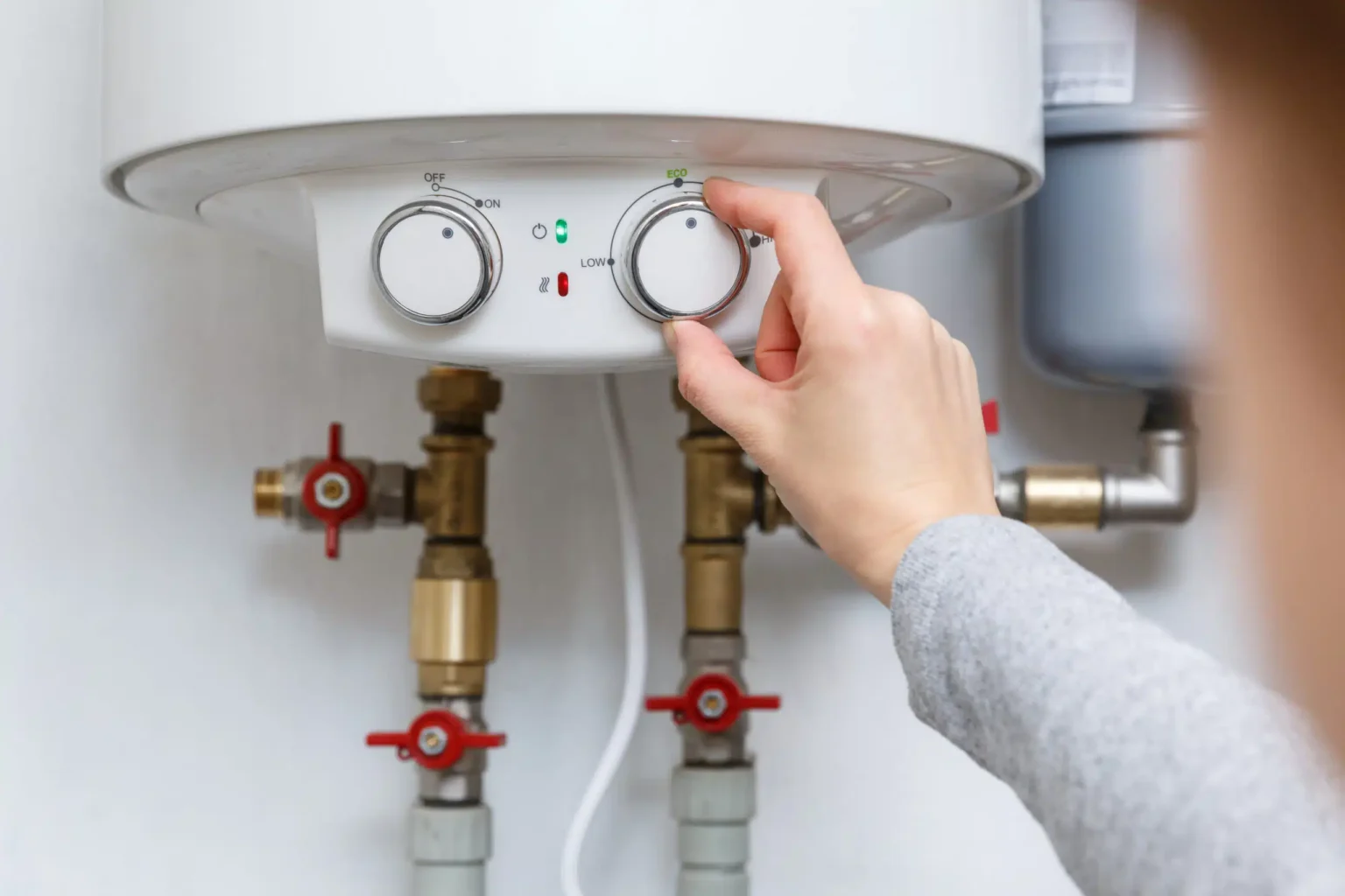 Technician adjusting a water heater in Rocklin